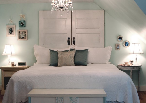 Bedroom,Enthralling Light Blue Wall Paint Headboard Design Ideas With Creative White Wood Door Headboard And Comfortable White Bed Cover Plus Soft Some Pillows Also Stylish White Wood Bench For Antique Concept,Comfortable Bed With Headboard Designs