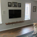 Furniture,Fascinating White Wall Paint Flat Screen Tv Wall Design Inspiration With Amazing Black Tv Wall Unit And Beautiful Brown Wood Shelves Plus Gorgeous Picture Frames Also Nice Brown Wood Floor ,Stunningly Beautiful And Modern Flat Screen Tv Wall Designs