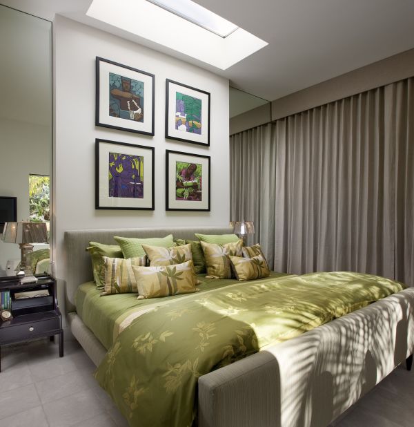 Bedroom,Nice Spectacular White Wall Paint Small Designer Bedroom With Stunning Picture Frames And Cool Light Brown Platform Bed On Combined Comfortable Green Bed Sheet Also Trendy Black Wood Nighstand Table Plus Elegant Table Lamp,The Best Modern Small Designer Bedrooms