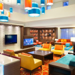Furniture,Delightful Interior Design Architect With Adorable Colorful Sofas And Beautiful Brown Wood Table Plus Nice Tv Wall Units Also Wonderful Orange Blue Pendant Lamps,Modern Interior Design Architects For Your Homes