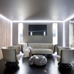 Furniture,Admirable Interior Design Architect With Stylish Broken White Leather Sofas And Unique Brown White Ottoman On Combined Nice Black Ceramic Tile Floor Also Cool Tv Wall Units On The White Wall,Modern Interior Design Architects For Your Homes