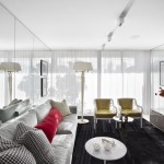 Furniture,Minimalist Interior Design Ideas With Amazing Gray Fabric Sofa On Combined Soft Cushions And Nice Round White Wood Table Plus Cool Large Black Rug Also Luxurious White Drum Floor Lamp,Cool Home Interior Designs Of 2015