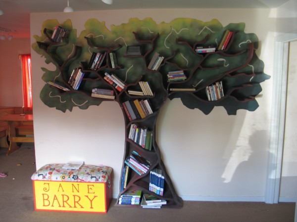 Furniture,Awesome Book Shelf Design Ideas With Charming Wooden Tree Bookshelf And Cute Bench Also Gorgeous White Wall Paint For Unique Concept,Contemporary Furniture Book Shelf Designs 2015