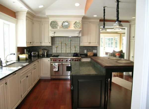 Kitchen,Fashionable Small Space Kitchen 2012 Design With Stunning White Wood L Shaped Kitchen Cabinet And Beautiful White Wood Floating Kitchen Cabinet Also Wonderful Black Kitchen Island Plus Trendy Brown Wood Floor,Contemporary Kitchens 2012