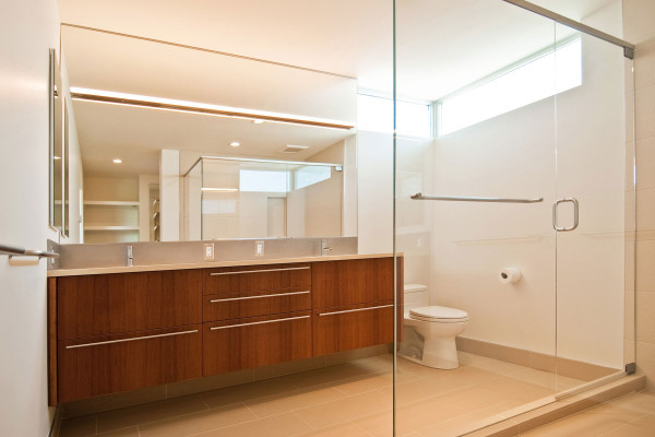 Bathroom,Admirable Small Space Best Modern Bathroom Decoration With Amazing Cherry Bathroom Cabinet And Picturesque Glass Bulk Head Wall Plus Comfortable White Ceramic Toilet On Combined Nice Cream Ceramic Tile Floor Also Gorgeous Bathroom Clear Glass Door,The Best Modern Bathrooms Design Great