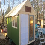Exterior,Impressive Mini House On Wheel Design Inspiration With Charming Wooden Roof And Beautiful Wooden Green Wall Paint Also Wonderful White Iron Sheeting Wall Plus Large Glass Window ,Cool Awesome Mini Houses On Wheels Inspiration