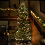 Furniture,The Best Tall Xmas Tree Decoration With Wonderful Xmas Tree Lights In Beautiful White Color And Adorable Black Wood Desk Also Nice Brown Wood Stairway,Awesome Xmas Trees Latest For Christmas