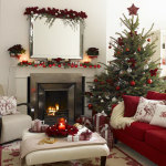 Furniture,Fancy Small Space Design Christmas Tree Ornament With Charming Red Sofa And Wonderful Green Corner Christmas Tree On Combined Nice Red White Ball Ornaments Also Modern Stainless Fireplace Plus Cool Square Wall Mirror For Modern Concept,Spectacular Designer Christmas Tree Ornaments