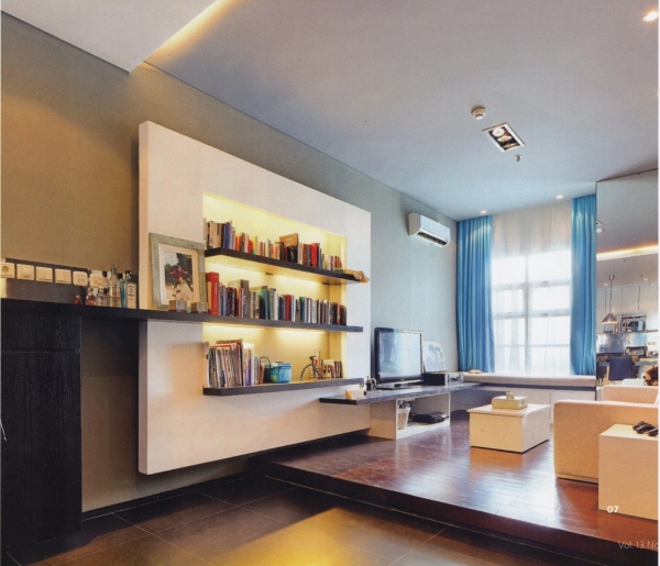 Apartments,Awesome Large Space Studio Apartment Interior Design Ideas With Stunning Cream Single Seater Sofa On Combined Nice Brown Laminate Flooring And Beautiful Entertainment Tv Plus Wonderful Great Open Book Shelves Also Adorable Blue White Curtains ,Extraordinary Studio Apartment Interior Designs