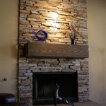 Interior,Nice Looking Cream Wall Paint Stone Fire Places Design Ideas With Stunning Bright Brown Brick Stone Fireplace And Wonderful Brown Wood Wall Mount Shelf Also Comfortable Dark Leather Sofa,The Beauty Of Stone Fire Places Your Home Inspiration