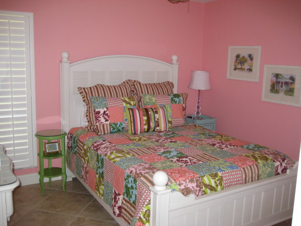 Bedroom,Exquisite Pink Wall Paint Kid Picture Ideas With Breathtaking White Wood Bed Frame On Combined Cute Colorful Floral Ornaments Bed Cover And Wonderful Blue Wood Nightstand Table Also Beautiful White Drum Table Lamp,Cute And Delightful Bedrooms Kid Picture Ideas
