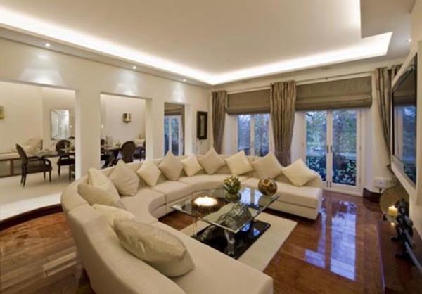 Furniture,Enticing White Wall Paint Furniture Small Space Design Ideas With Comfortable Curved Shaped Broken White Sectional Sofa On Combined Soft Cream Cushions And Cool Rectangular Glass Table Plus Nice Brown Glossy Laminate Flooring Also Comfortable Dining Room,Modern Living Room Design With Comfortable Furniture Small Spaces