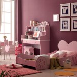 Furniture,Pretty Bedroom Interior Design Picture With Unique Pink Wood Bed Frame And Cute Pink Study Table Plus Comfortable Pink Small Chair Also Picturesque White Picture Frame On The Purple Wall For Kids Bedroom,Pretentious Interior Design Pictures 2015