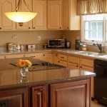 Interior,Impressive Cream Wall Paint Small Luxury Kitchen Design With Awesome Cream Wood Kitchen Cabinet On Combined Cool Gray Marble Countertop And Beautiful Cream Floating Wood Kitchen Cabinet Also Picturesque Oversized Kitchen Pendant Lamp,Best Small Luxury Kitchens Inspiration