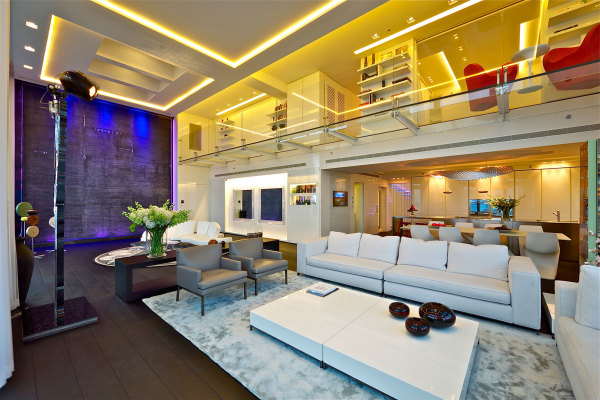 Apartments,Magnificent Sky Mantahattan Penthouse Apartement Design Inspiration With Cool Amazing White Leather Sectional Sofa And Nice Two Gray Leather Sofa Chair Also Soft White Rug On Combined Wood Floor In Dark Brown Color ,Manhattan Penthouse Apartments