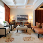Interior,Contemporary Interior Designer Living Room Decoration With Comfortable Sofas And Cool White Leather Table Plus Beautiful Large Red Pattern Curtains Also Gorgeous White Wall Paint,The Best High Quality And Cheap Interior Designer Living Rooms