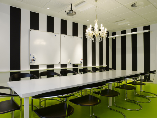Furniture,Very Luxurious Black White Striped Wall Paint Conference Table Design Ideas With Stylish White Large Conference Table And Modern Metal Office Chairs On Combined Beautiful Green Floor Also Elegant Chandelier ,Cool Conference Table Designs For Modern Office