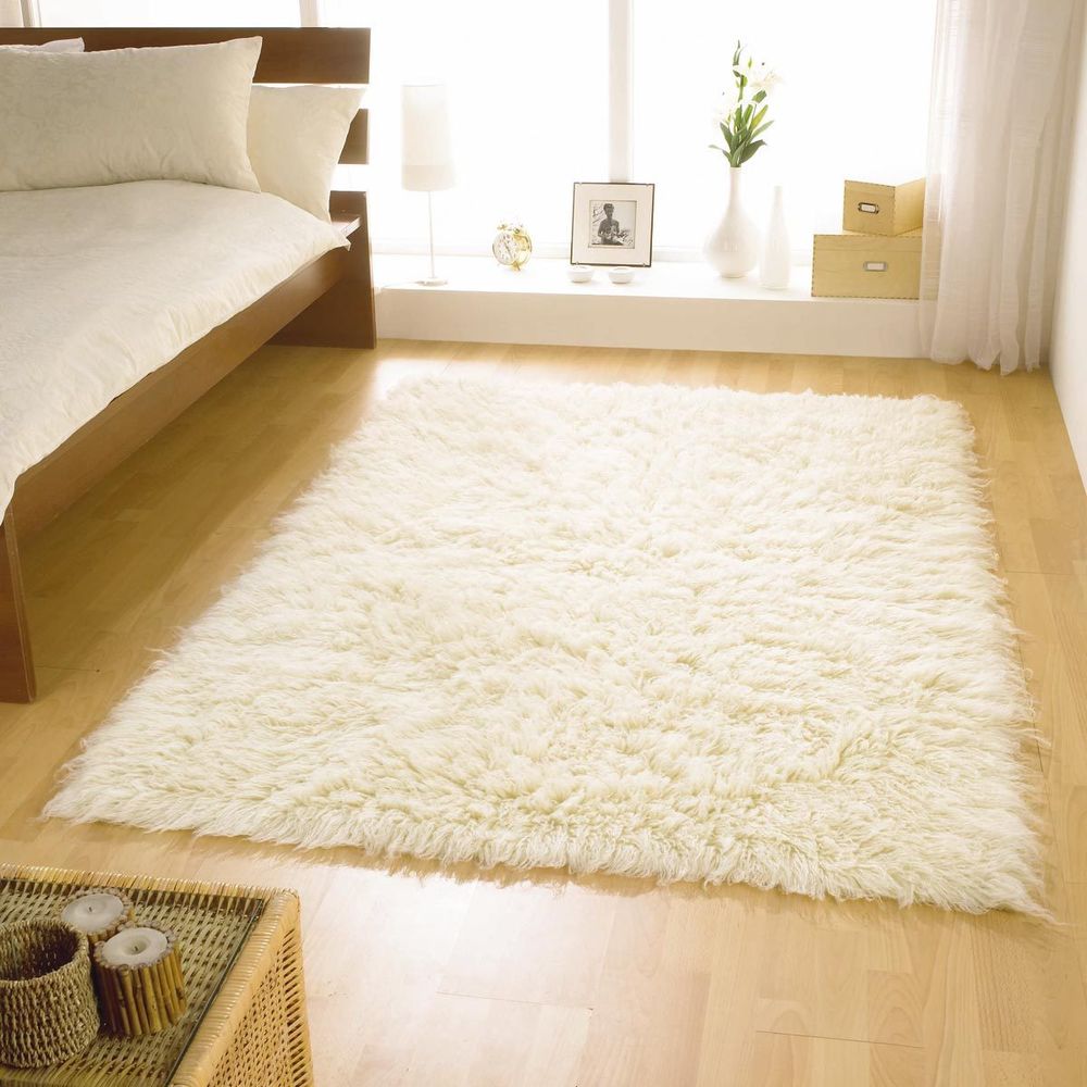 Interior,The Best Soft Machine Made Wool Rug Design Ideas With White Color On Combined Laminate Flooring  ,Beautiful Wool Rugs Designs